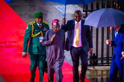 L-R: Tinubu's Aide-De-Camp, Lt Colonel Nurudeen Yusuf; President Bola Ahmed Tinubu; Tinubu’s CSO, Adegboyega Fasasi