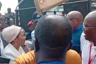 TENSION: Gunshot As Protesters Block Minister From Accessing Ministry In FCT